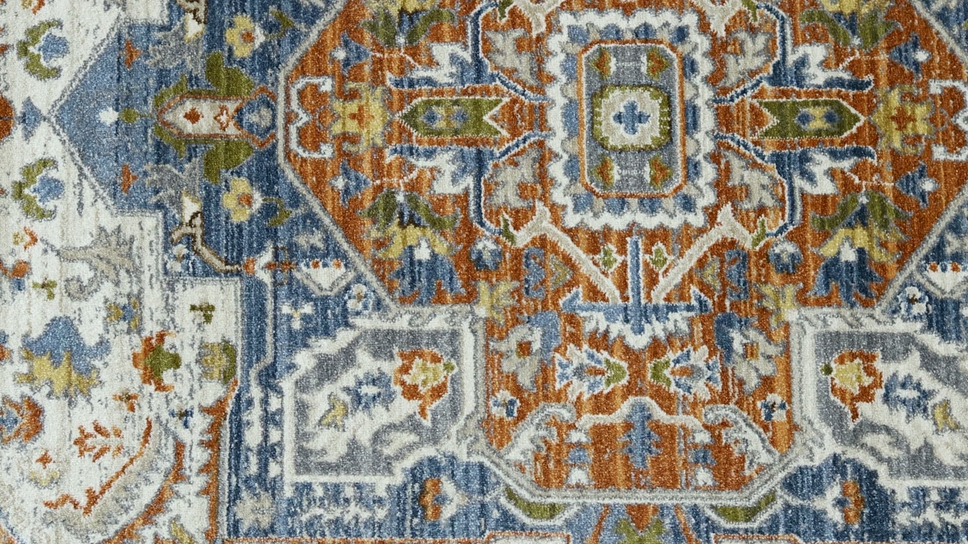 Palmetto Beige/Multi rug, filmed on a wood floor